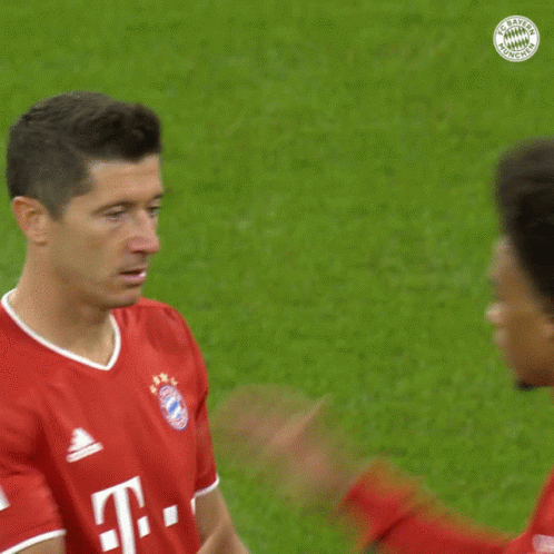 a man in a red jersey with the number 11 on it