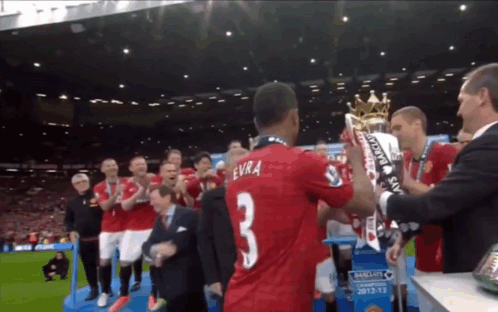 A Man In A Red Jersey With The Number 3 On The Back GIF