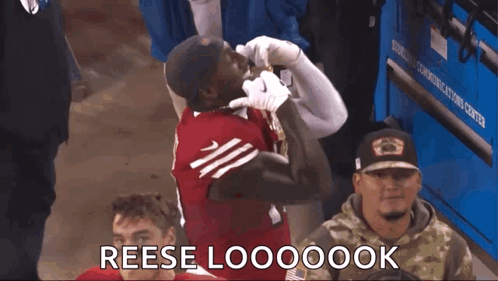 A Man In A Red Jersey With The Number 33 On It GIF