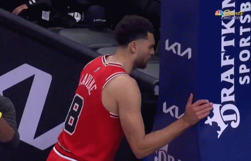 A Man In A Red Jersey With The Number 8 On It GIF