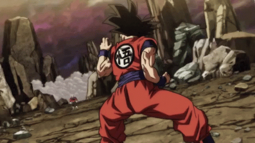 A Man In A Red Jumpsuit With A Chinese Symbol On His Chest GIF