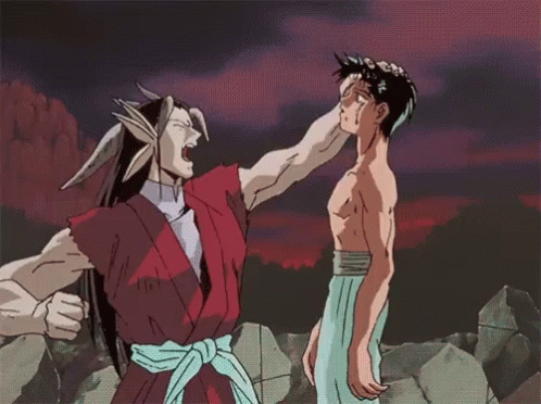 A Man In A Red Kimono Is Pointing At Another Man In A White Towel GIF