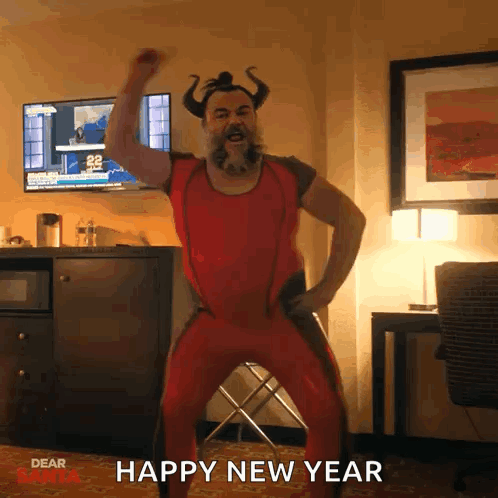 A Man In A Red Outfit With Horns Is Dancing In A Room With The Words Happy New Year Written On The Bottom GIF