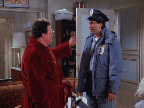 A Man In A Red Robe Is Talking To A Man In A Mailman Uniform GIF