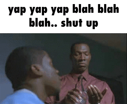 A Man In A Red Shirt And Tie Is Talking To Another Man GIF