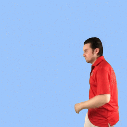 A Man In A Red Shirt And White Pants Is Dancing On A Blue Background GIF