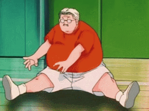 A Man In A Red Shirt And White Shorts Sits On A Black Object GIF