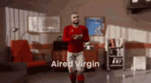 A Man In A Red Shirt Is Dancing In A Living Room With The Words " Aired Virgin " Written On The Bottom GIF