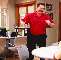 A Man In A Red Shirt Is Dancing In A Room With Chairs GIF