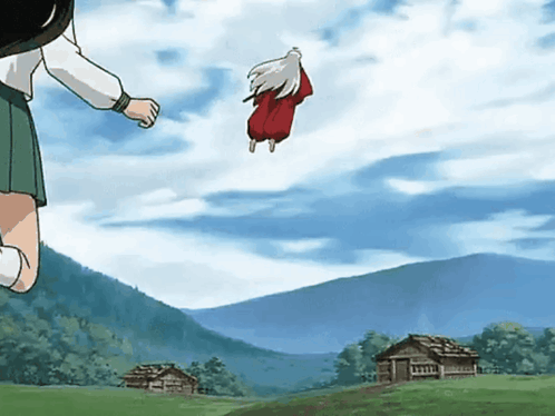 A Man In A Red Shirt Is Flying Through The Air GIF
