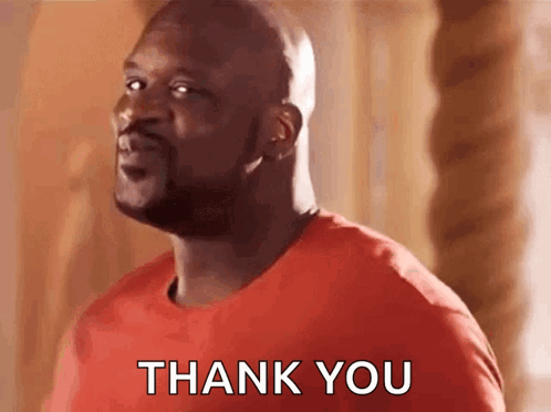 A Man In A Red Shirt Is Giving A Thank You Sign . GIF