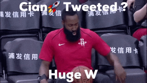 A Man In A Red Shirt Is Holding A Basketball And The Words Tweeted Huge W Are Above Him GIF