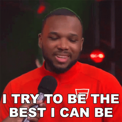 A Man In A Red Shirt Is Holding A Microphone And Says I Try To Be The Best I Can Be GIF