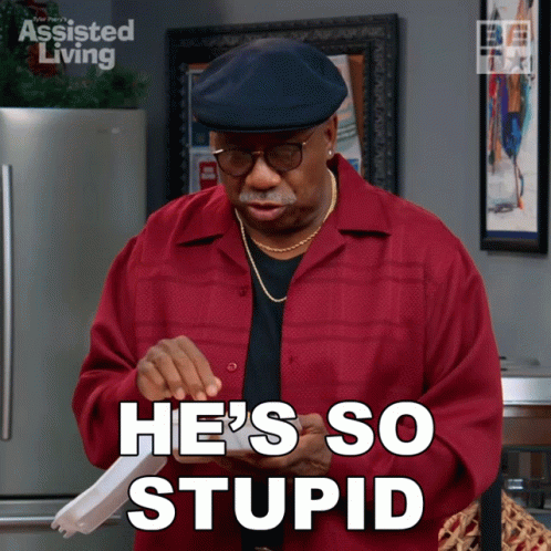 A Man In A Red Shirt Is Holding A Piece Of Paper And Says He 'S So Stupid GIF