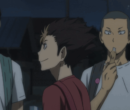 A Man In A Red Shirt Is Holding A Piece Of Paper GIF