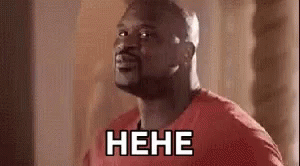 A Man In A Red Shirt Is Laughing With The Word Nene Written On His Chest . GIF