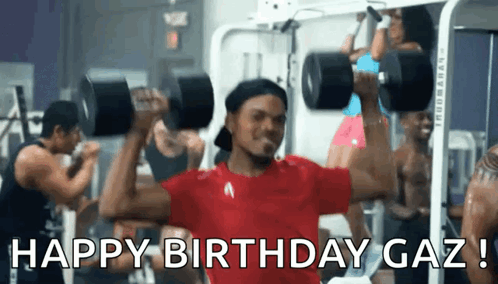 A Man In A Red Shirt Is Lifting A Dumbbell In A Gym With The Caption Happy Birthday Gaz GIF