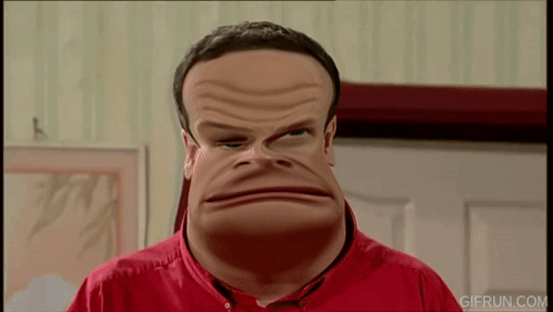 a man in a red shirt is making a funny face and the website gifrun.com is visible in the corner