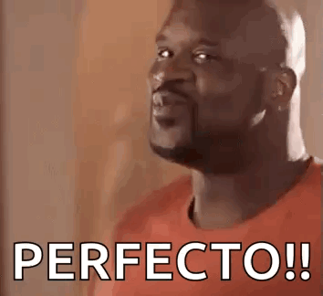 A Man In A Red Shirt Is Making A Funny Face With The Words Perfecto ! GIF