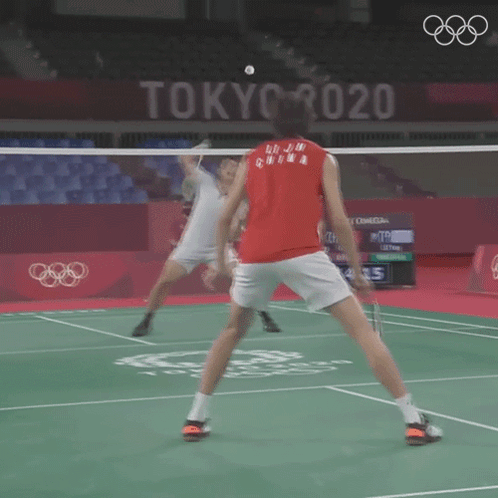 A Man In A Red Shirt Is Playing Badminton In Tokyo 2020 GIF