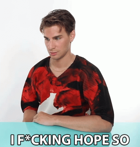 A Man In A Red Shirt Is Sitting At A Table With The Words I F * Cking Hope So Written Below Him GIF