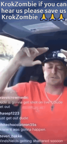 A Man In A Red Shirt Is Sitting In A Car With The Words Krokzombie If You Can Hear Us Please Save Us GIF