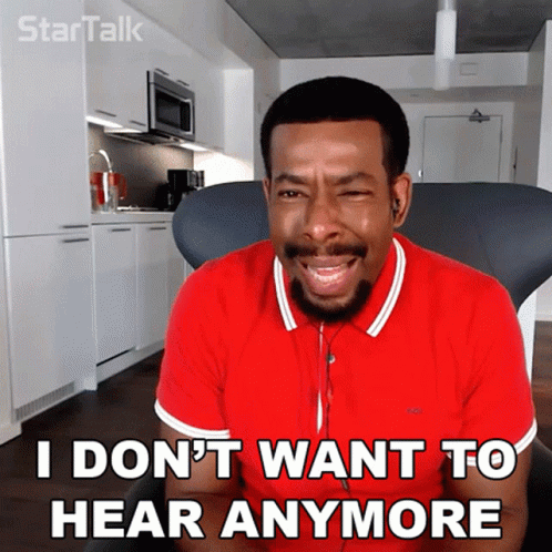 A Man In A Red Shirt Is Sitting In A Chair And Says I Do N't Want To Hear Anymore GIF