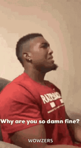A Man In A Red Shirt Is Sitting On A Couch And Asking Why Are You So Damn Fine . GIF