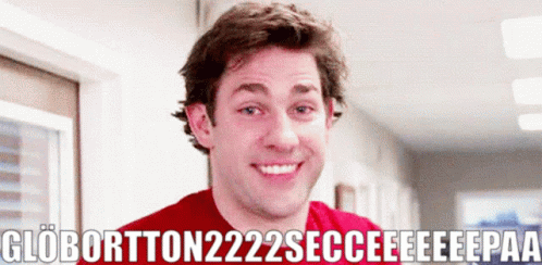 A Man In A Red Shirt Is Smiling In A Hallway With The Words Globortton222secceeeeeepaa GIF