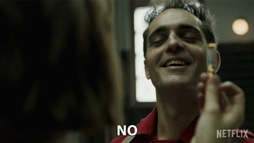 A Man In A Red Shirt Is Smiling With The Word No Written On His Face GIF