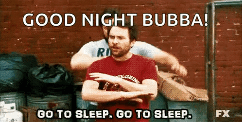 A Man In A Red Shirt Is Standing In Front Of A Brick Wall With A Caption That Says Good Night Bubba . GIF