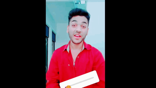 A Man In A Red Shirt Making A Funny Face GIF