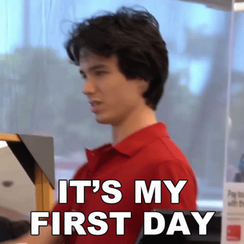 A Man In A Red Shirt Says It 'S My First Day In White Letters GIF