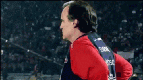 A Man In A Red Shirt Says Siempre Pasa Algo Matias In Spanish GIF