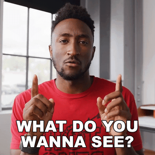 A Man In A Red Shirt Says " What Do You Wanna See " In White Letters GIF