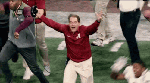 A Man In A Red Shirt With The Letter A On It Is Running On A Field GIF