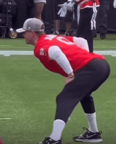 A Man In A Red Shirt With The Number 10 On It GIF