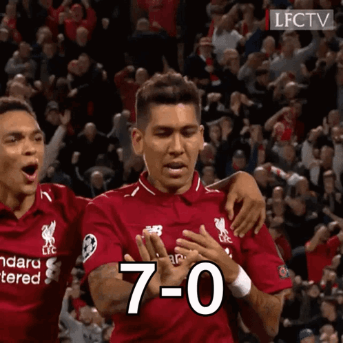 A Man In A Red Shirt With The Number 7 On His Chest GIF
