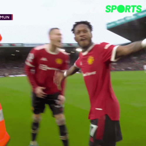 A Man In A Red Shirt With The Number 7 On It GIF