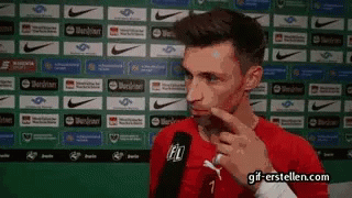 A Man In A Red Shirt With The Number 7 On It GIF
