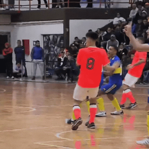 A Man In A Red Shirt With The Number 8 On The Back GIF