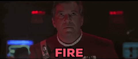 A Man In A Red Shirt With The Word Fire Written On It GIF