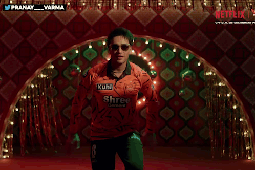 A Man In A Red Shirt With The Word Shree Cement On It GIF