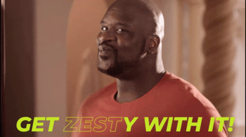 A Man In A Red Shirt With The Words Get Zesty With It Behind Him GIF