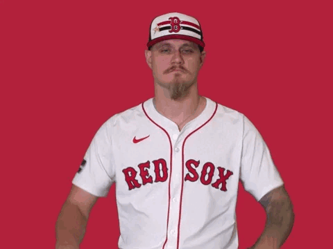 A Man In A Red Sox Jersey Giving A Thumbs Down Sign GIF