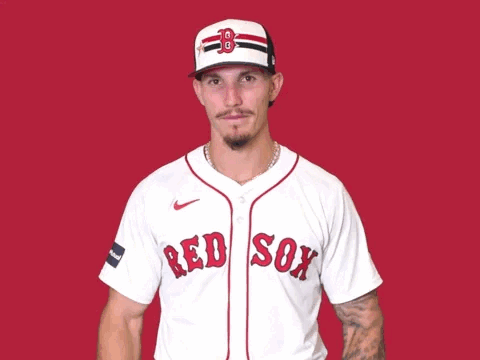 A Man In A Red Sox Jersey Is Giving A Thumbs Down GIF