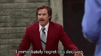 A Man In A Red Suit And Tie Is Making A Funny Face And Saying `` I Immediately Regret This Decision '' . GIF