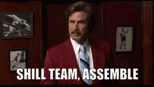 A Man In A Red Suit And Tie Is Saying " Shill Team Assemble " GIF