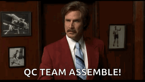 A Man In A Red Suit And Tie Says Qc Team Assemble ! GIF
