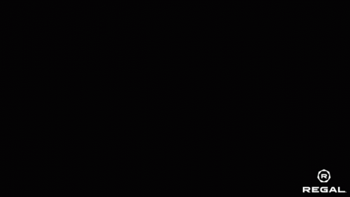 Man In Red Superhero Costume Standing In Doorway GIF